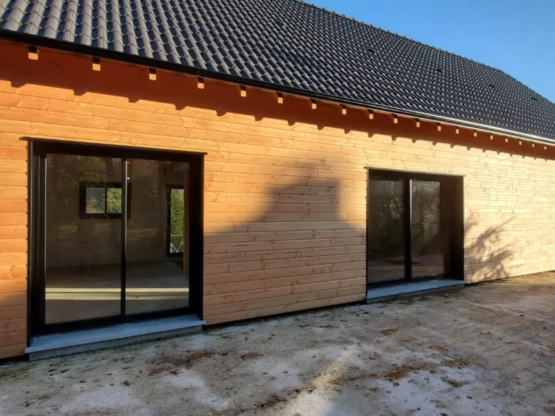 Baies vitrées de maison en bois